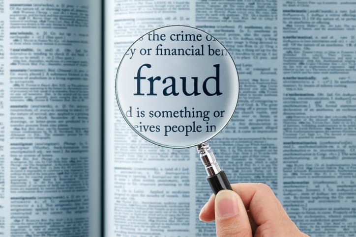 AI fraud losses represented by digital security breach graphic