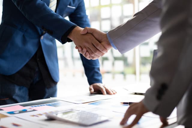 Handshake 2 e1704716469684.jpg
