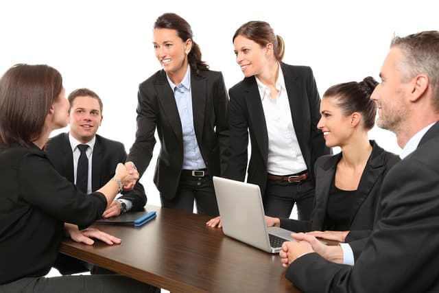 Better consent solicitation, board directors meeting around a table