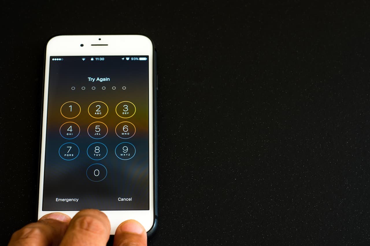 Smartphone passcode screen, illustrating OneSpan Q3 2026 authentication results