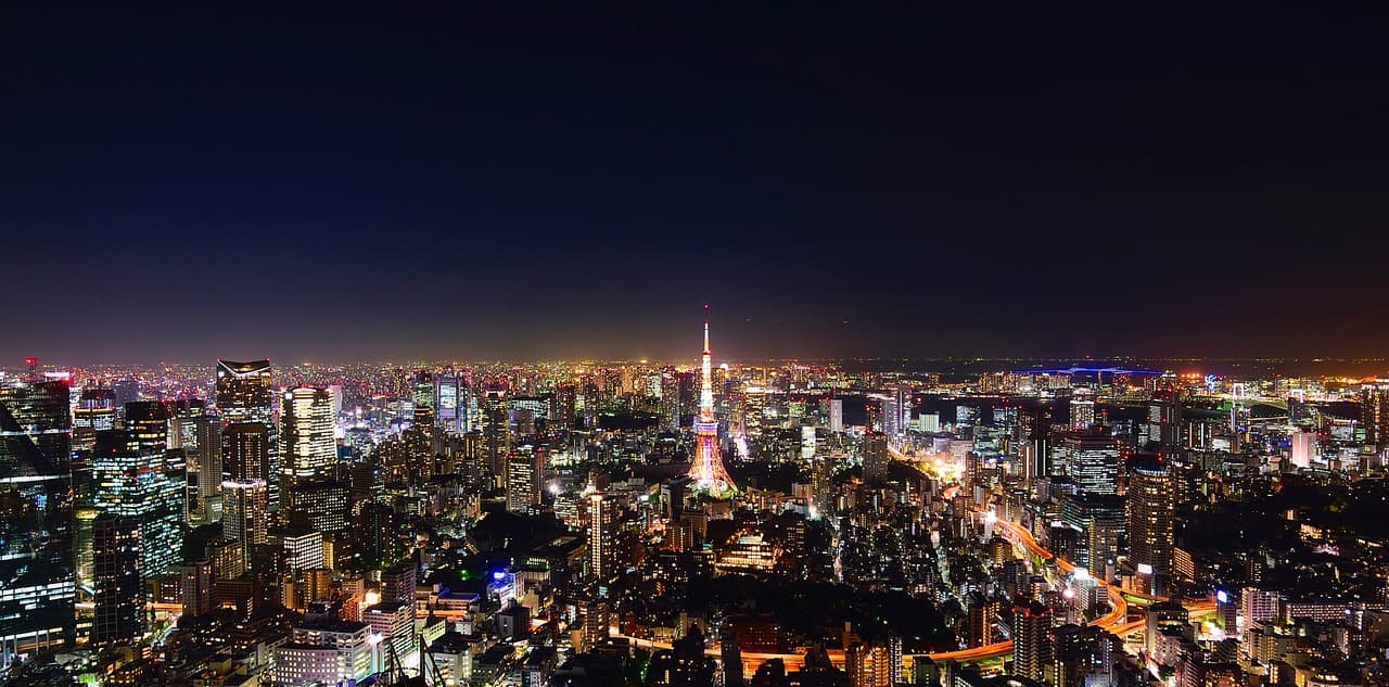 Tokyo skyline at night, where the SBI Cross River joint venture would be based