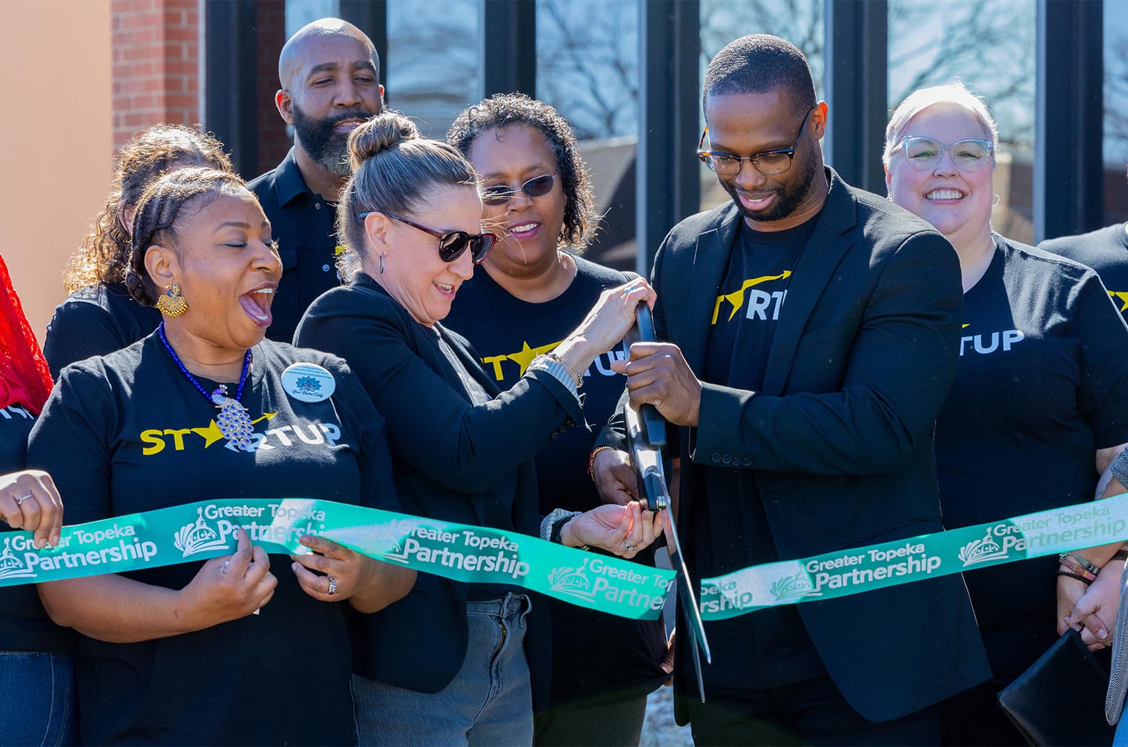 Cutting the ribbon on omnis topeka startup community.jpg