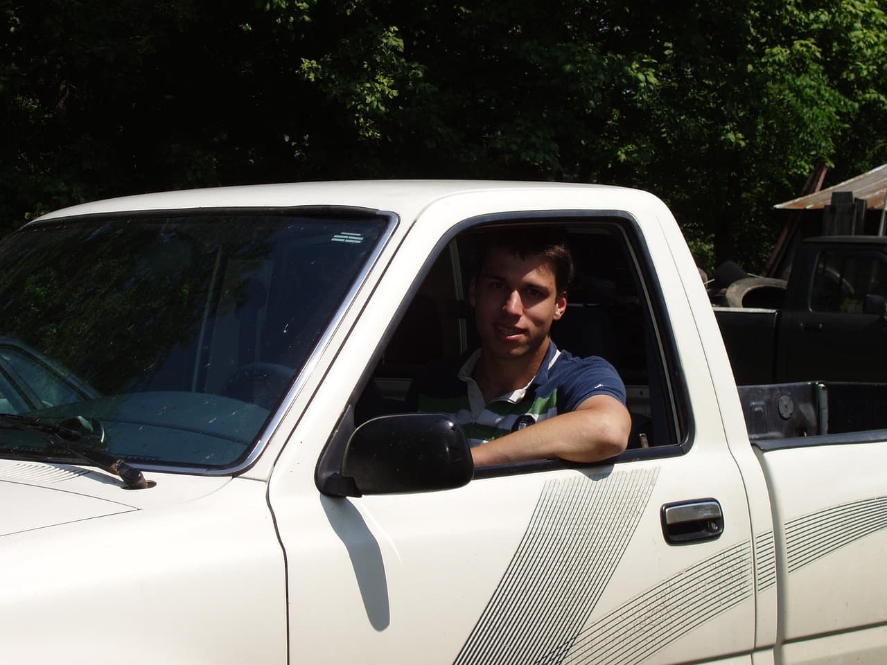Equal Parts, commercial truck driver in the cab of a vehicle