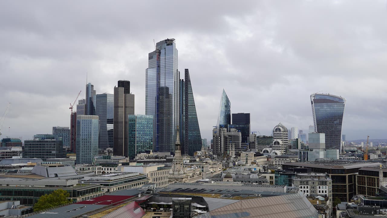 City of London skyline, home of Janus Henderson, issuer of Janus Henderson JQQQ